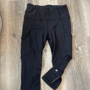 Lululemon Black Leggings with mesh/peakaboo  inner thigh